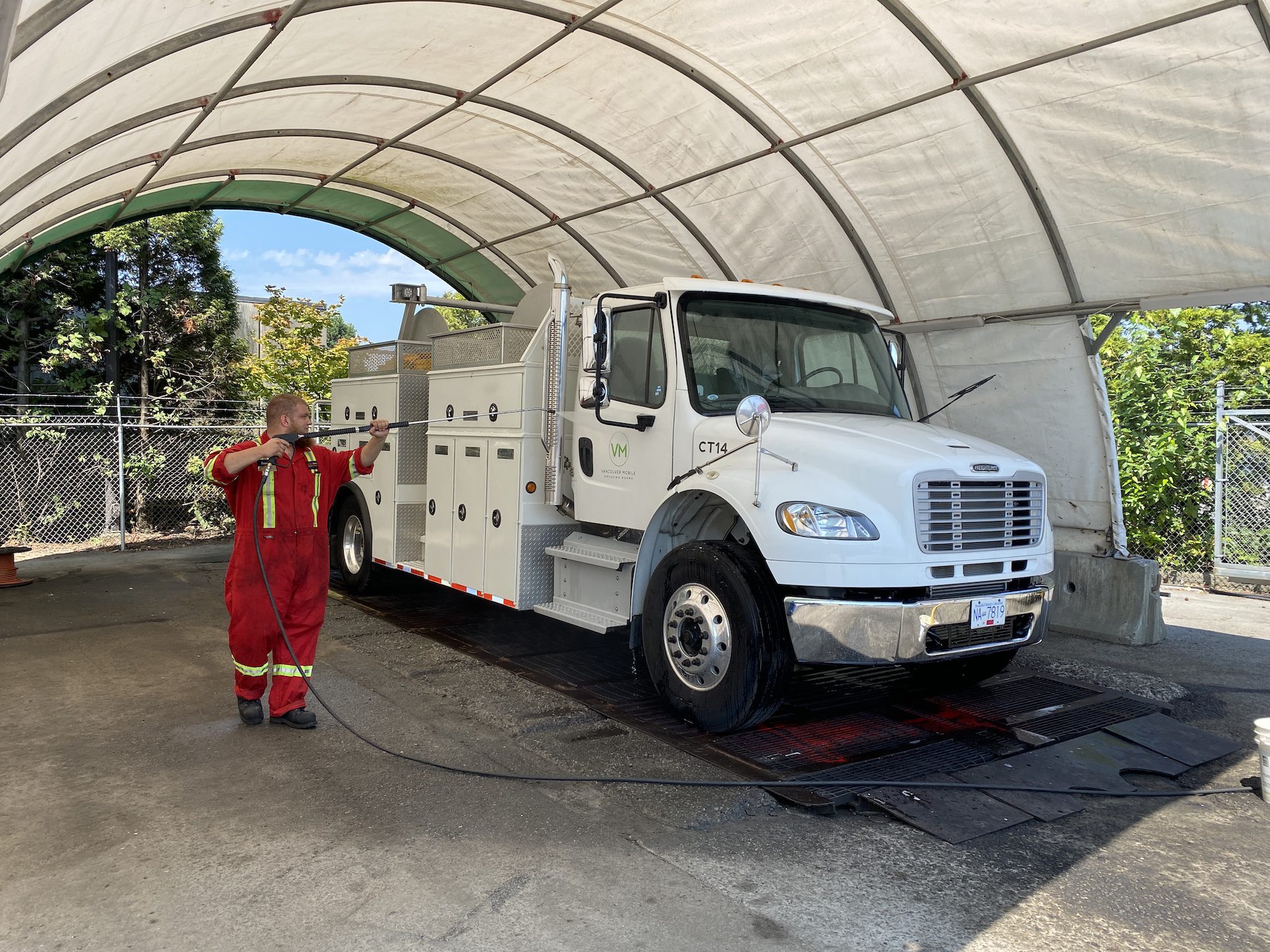 Cleaning a heavy truck at our wash bay
